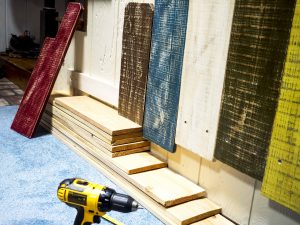 art installation mounting fence boards wall feature